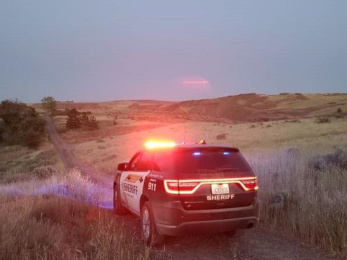 Patrol Vehicle in Grass Field