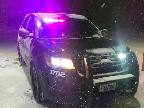 Patrol Vehicle on a Snowy Night
